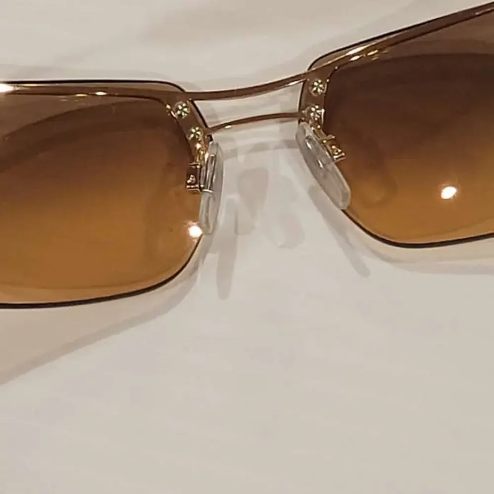 DKNY 7252S 717 Sunglasses 62x14x120 Half rim metal frame